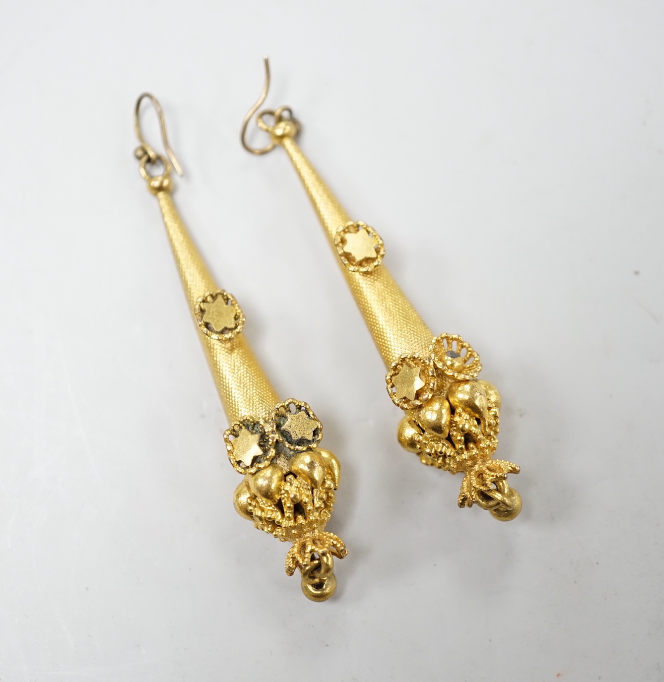 A pair of Victorian yellow metal conical shaped drop earrings, 56mm, gross weight 8.6 grams.